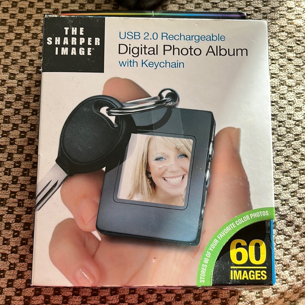 The Sharper Image USB 2.0 Rechargeable Digital Photo Album with Keychain